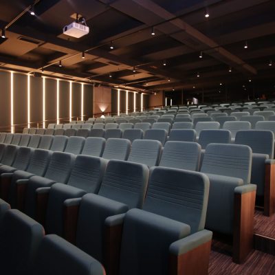 An,Empty,Auditorium,Interior,With,Rows,Of,Seats