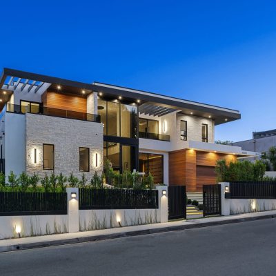 Modern,Two-story,House,With,A,Sleek,Design,,Illuminated,Exterior,,And